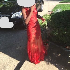 red form fitting prom gown